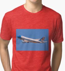 Air force One in flight with a blue sky background Tri-blend T-Shirt