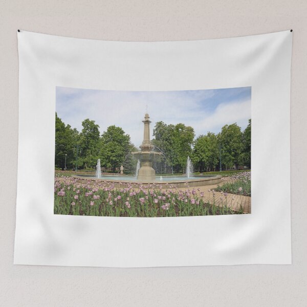 Item preview, park with fountain and tulip flowers Eger Hungary landmark designed and sold by goceris.