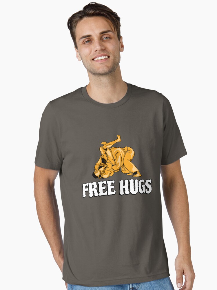 Thumbnail 1 von 7, Essential T-Shirt, Free Hugs - Martial Arts Gift designt und verkauft von yeoys.