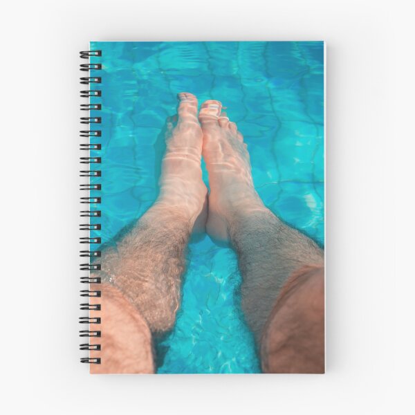 Item preview, Young man relaxation at the swimming pool with his legs in the water designed and sold by Maor Winetrob.