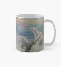 Pelicans Lunching near the Water Mug