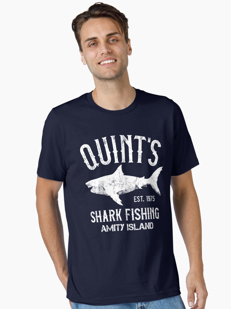 Aperçu 1 sur 7. T-shirt essentiel avec l'œuvre Pêche au requin de Quint - Amity Island 1975 créée et vendue par IncognitoMode.