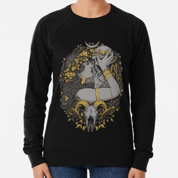 avec un crâne humain et bélier dans un cadre botanique. Sweatshirt léger