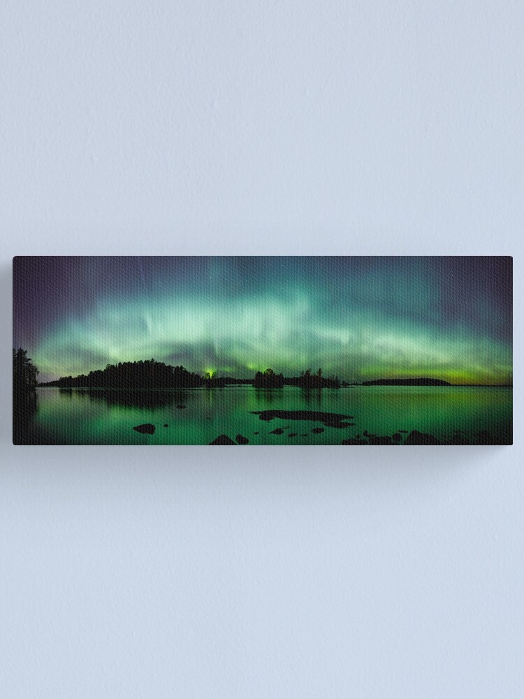 Alternate view of Beautiful northern lights over lake panorama Canvas Print