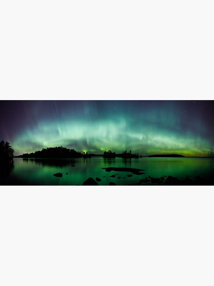 Beautiful northern lights over lake panorama by Juhku