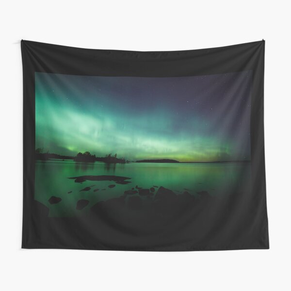 Beautiful northern lights over lake Tapestry