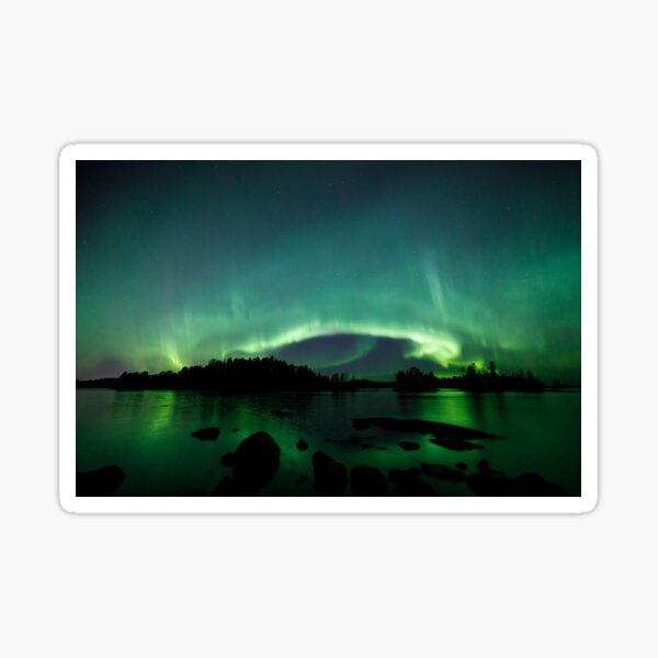 Beautiful northern lights over lake Sticker