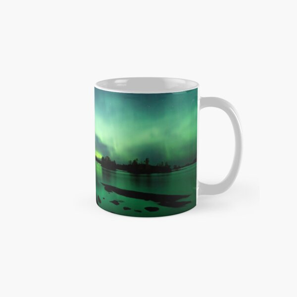 Beautiful northern lights over lake Classic Mug