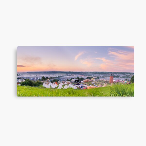 Glastonbury Festival at Sunset Panorama with Tipis Metal Print