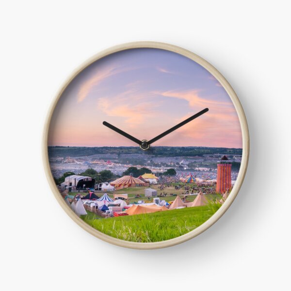 Glastonbury Festival at Sunset Panorama with Tipis Clock