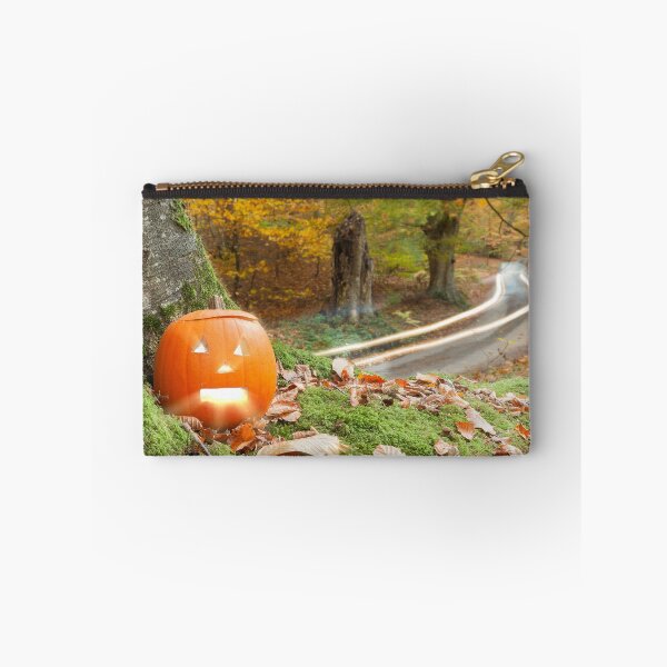 Item preview, Scary pumpkin in the autumn woods designed and sold by simonbratt.