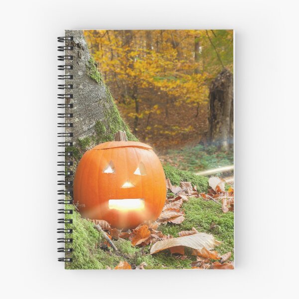 Item preview, Scary pumpkin in the autumn woods designed and sold by simonbratt.