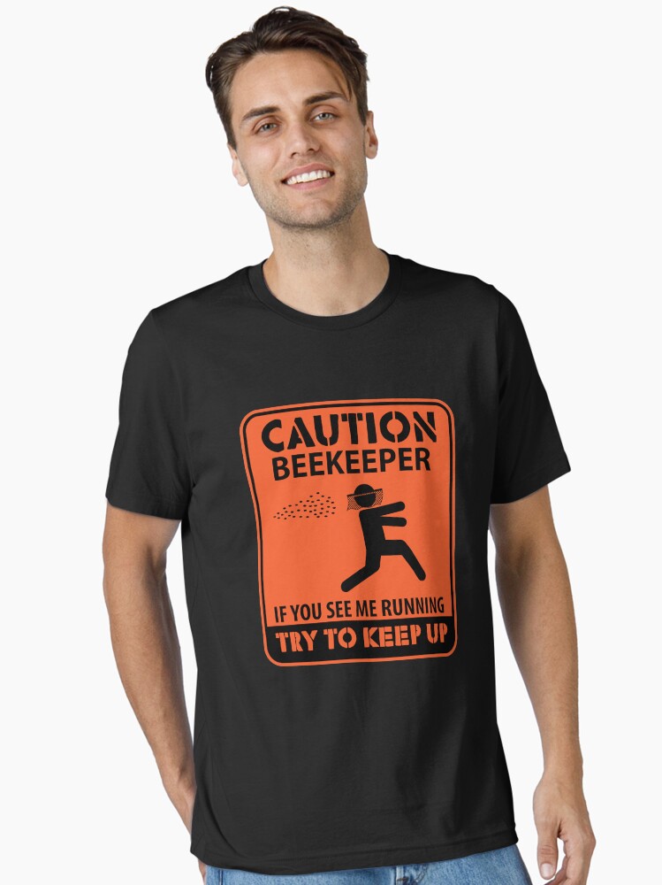 Thumbnail 1 von 7, Essential T-Shirt, Caution Beekeeper If You See Me Running - Beekeeping Gift designt und verkauft von yeoys.