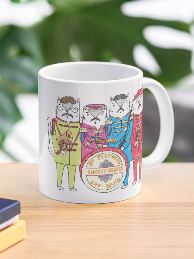 Aperçu 1 sur 6. Mug à café avec l'œuvre Le groupe Lonely Hearts Cats du SGT Peppurr créée et vendue par KatieRubyMiller.