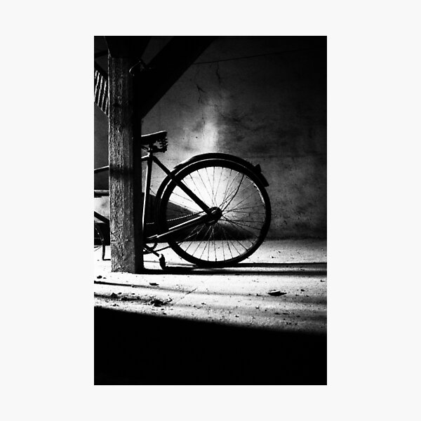 Old bicycle in a dusty attic Photographic Print