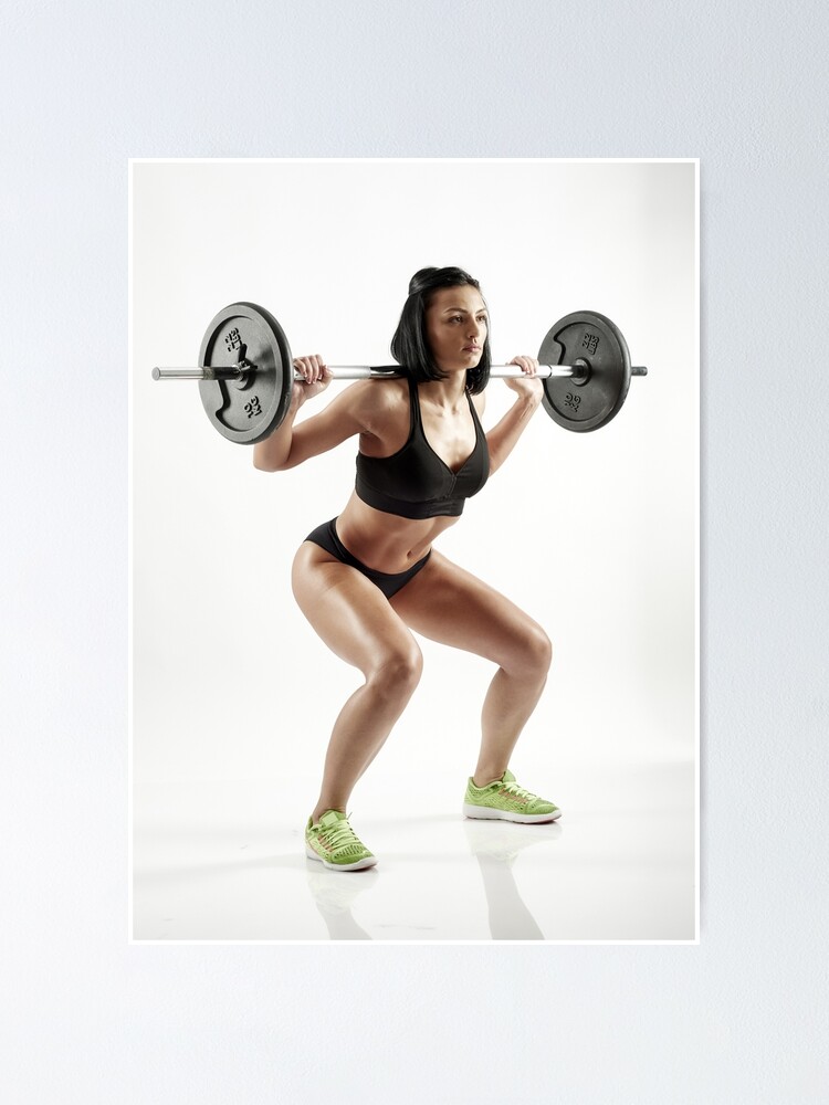 Young Petite Woman Performs The Exercise Squat With Barbell In The