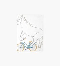 horse on a bicycle Art Board Print