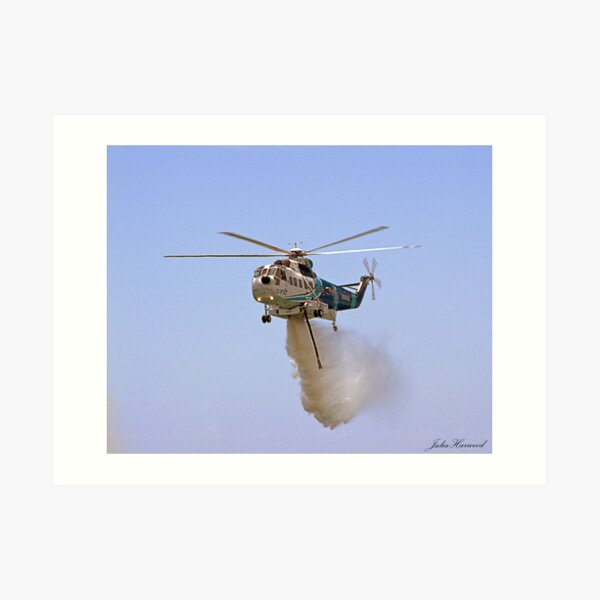 Helitanker dropping water Art Print