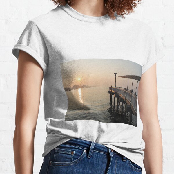 #sunset #water #sea #pier #beach #dusk #reflection #sky #lake #outdoors #landscape #horizontal #yellow #colorimage #sunrisedawn #nopeople #sun #sunny #watersedge #coastline #nonurbanscene Classic T-Shirt