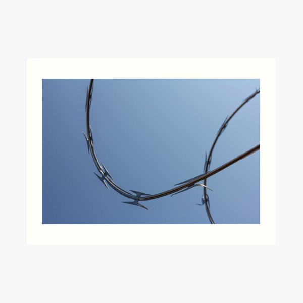 Razor wire silhouette against sky no.2 Art Print