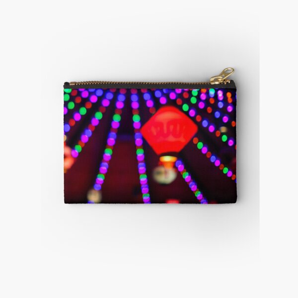 Item preview, Abstract background with multicolored bokeh, garland of multicolored light bulbs in defocus. designed and sold by alexvioletart.
