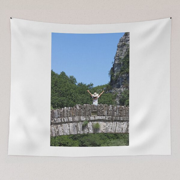 Item preview, little girl with hands up standing on kokkori stone bridge Zagoria Greece designed and sold by goceris.
