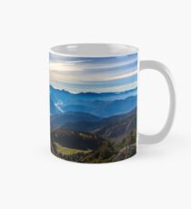 Sunny autumn day at the mount Tersadia in the italian alps Mug
