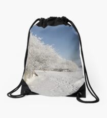 Snow on the river bank Drawstring Bag