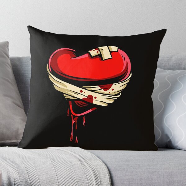 Broken heart bleeding bandaged Throw Pillow for Sale by