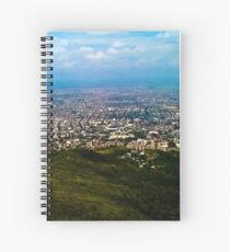 In the vastness of the sky. Spiral Notebook