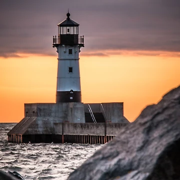 Artwork thumbnail, Lighthouse Through the Rocks by Rita Anthony