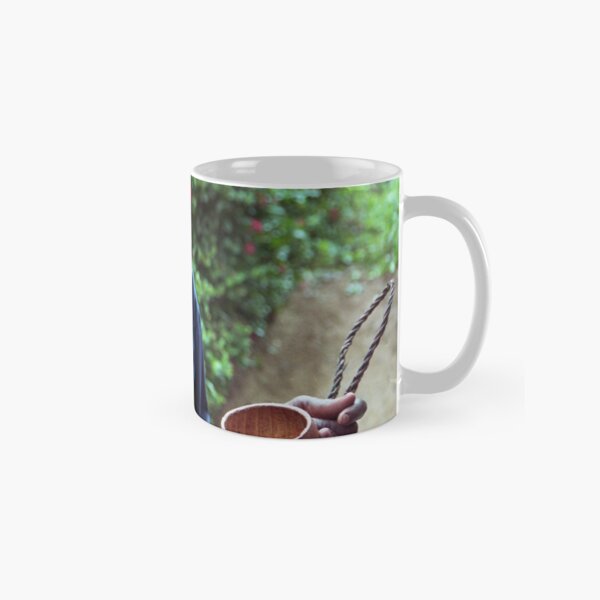 Drinking from palmwine gourd --H Classic Mug