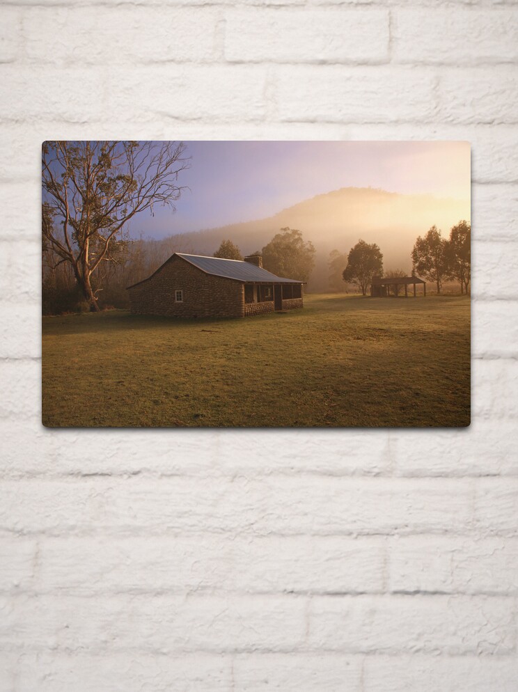 Metal Print, Misty dawn over GeeHe Hut, Kosciusko Nat. Park, Australia designed and sold by Michael Boniwell