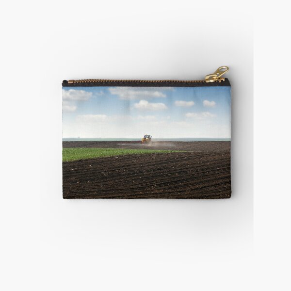 Item preview, tractor spraying plowed field at spring designed and sold by goceris.