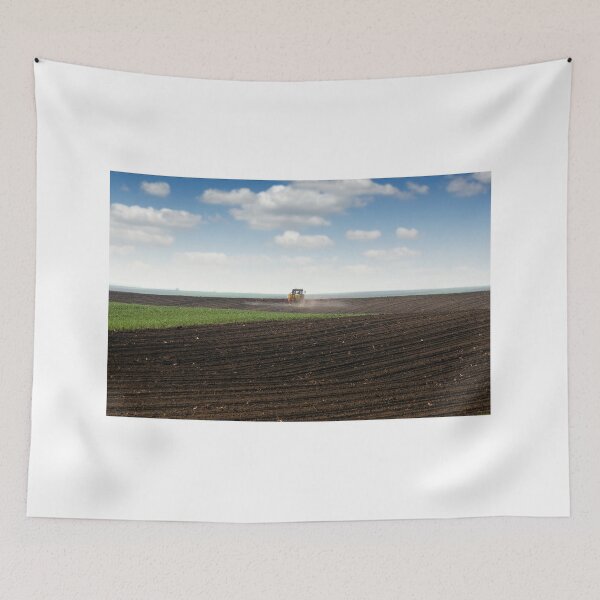 Item preview, tractor spraying plowed field at spring  designed and sold by goceris.