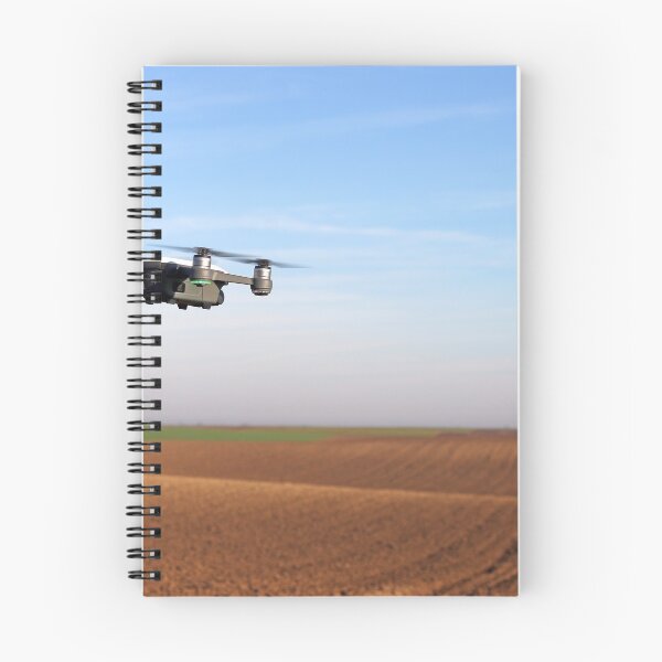 Item preview, The drone is flying over the plowed field designed and sold by goceris.