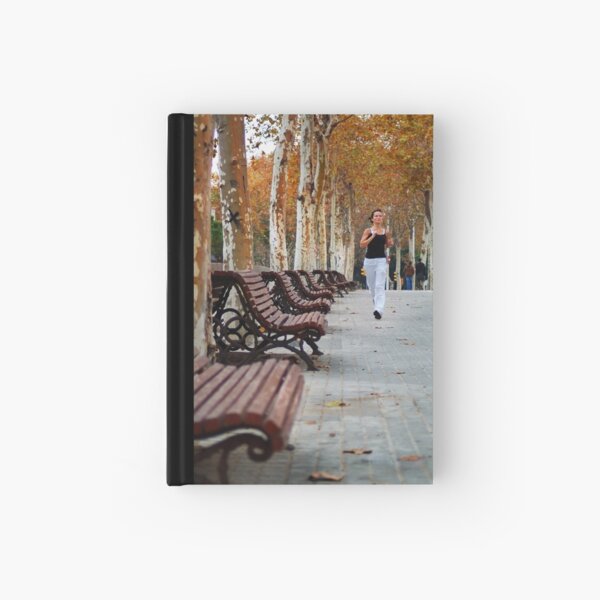 Girl Jogging in Barcelona Park Hardcover Journal