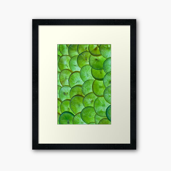 Slices of lime Framed Art Print