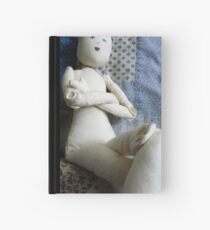 doll with no hair Hardcover Journal