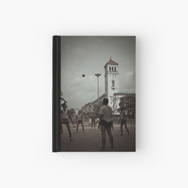 Playing chinlone in Yangon Hardcover Journal