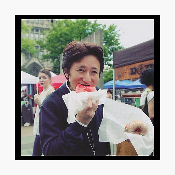 Araki Eating Donut Photographic Print