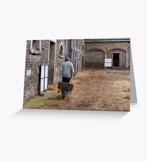 Man pulling a wheelbarrow Greeting Card