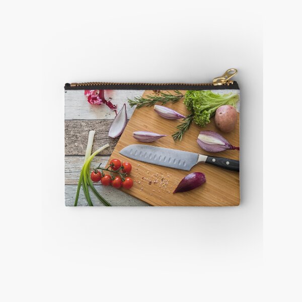 Item preview, Knife with healthy food - vegetables, onion, salad, tomatoes, potato placed on a cutting board with wood background top view designed and sold by Alex2789.