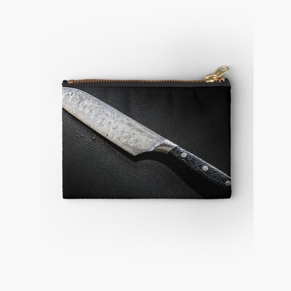 Item preview, Knife with drops of water isolated on a black background designed and sold by Alex2789.