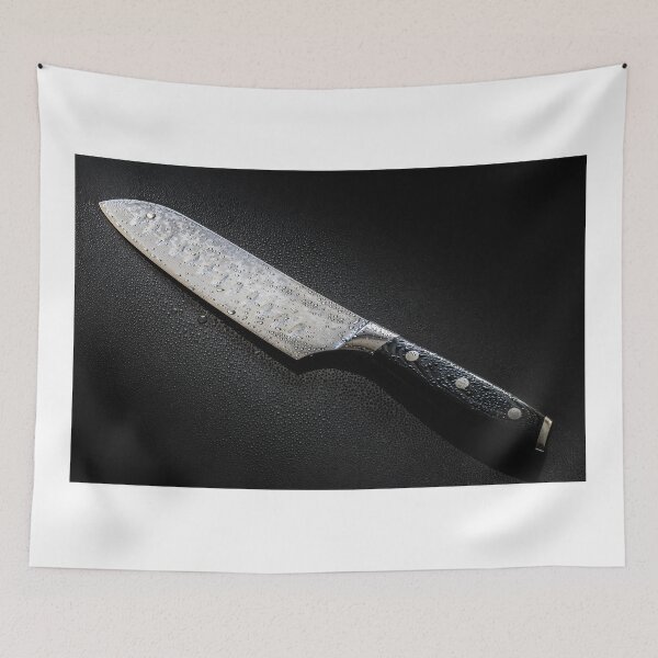 Item preview, Knife with drops of water isolated on a black background designed and sold by Alex2789.