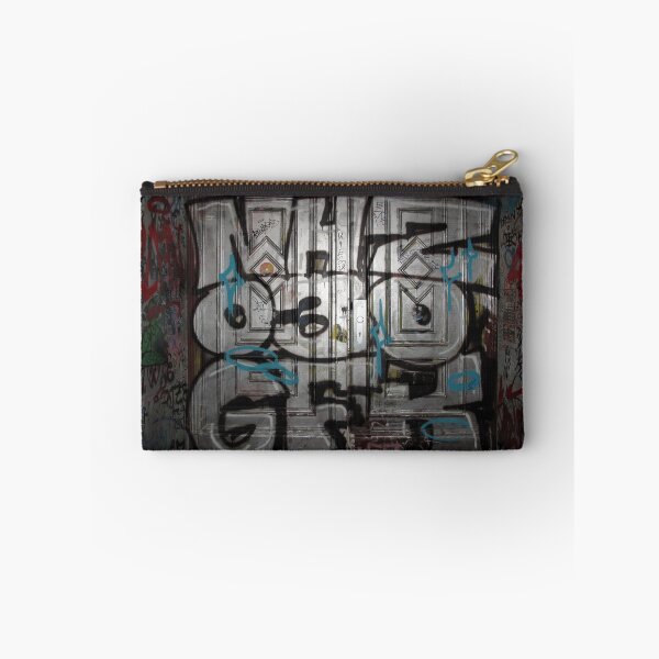 Item preview, Silvery, metallic graffiti spray on grungy door of residential building in Berlin, Germany  designed and sold by Reinvention.