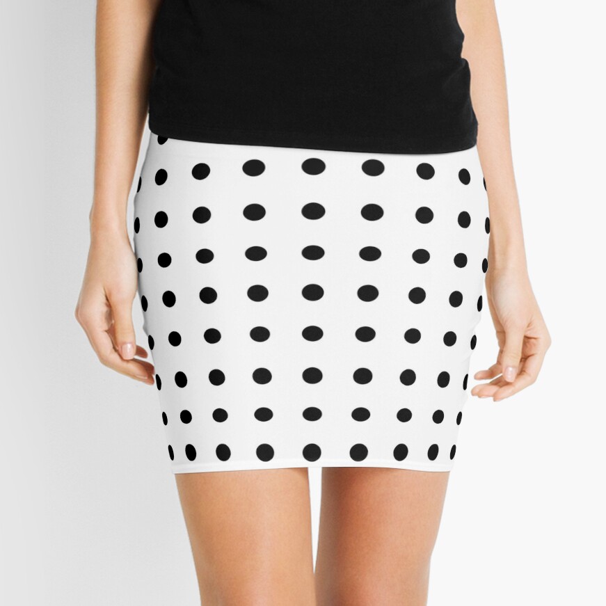 white mini skirt with black polka dots
