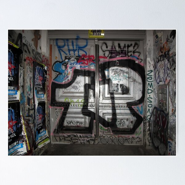 Item preview, Silvery, metallic graffiti spray on grungy door of residential building in Berlin, Germany  designed and sold by Reinvention.