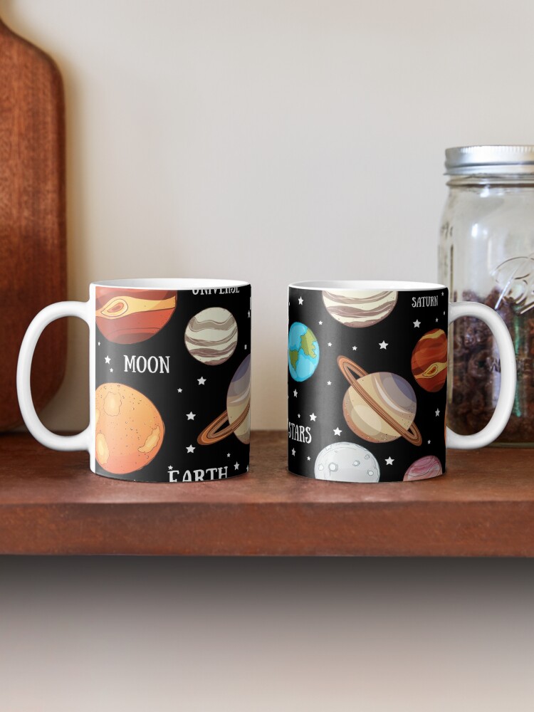 Heat-Changing Planet Mug: Coffee cup with a model of the Solar System.