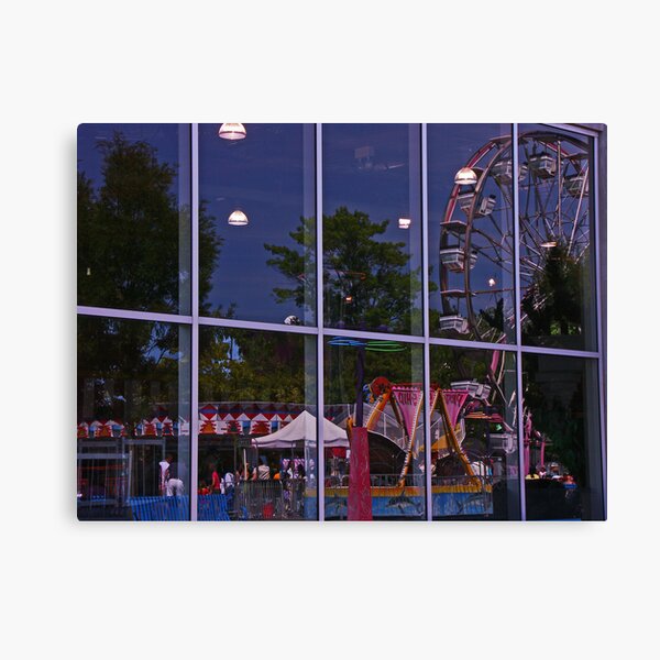 Reflections of the fairgrounds and rides Canvas Print